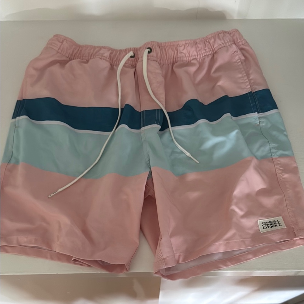 O'Neill Pink and Blue Swim Trunks with Color-Block Design